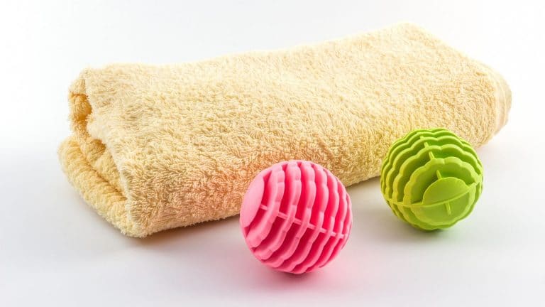 Can you safely put tennis balls in the washing machine